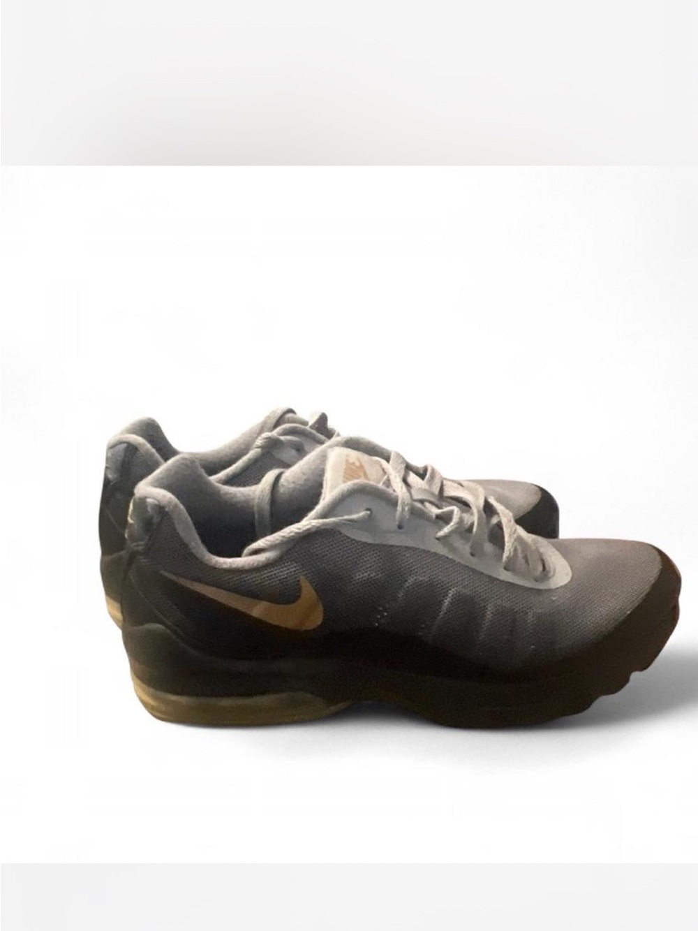 Nike Women’s Gray Athletic Sneakers with Gold Swoosh Accent